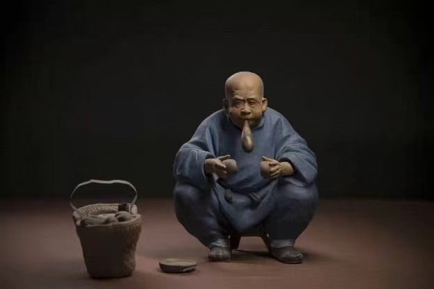 《吹糖艺人》